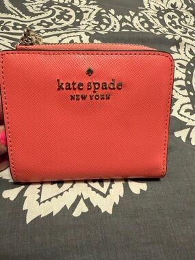 kate spade coral zip-around leather wallet
